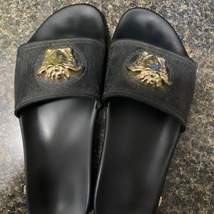 Black and gold Versace slides